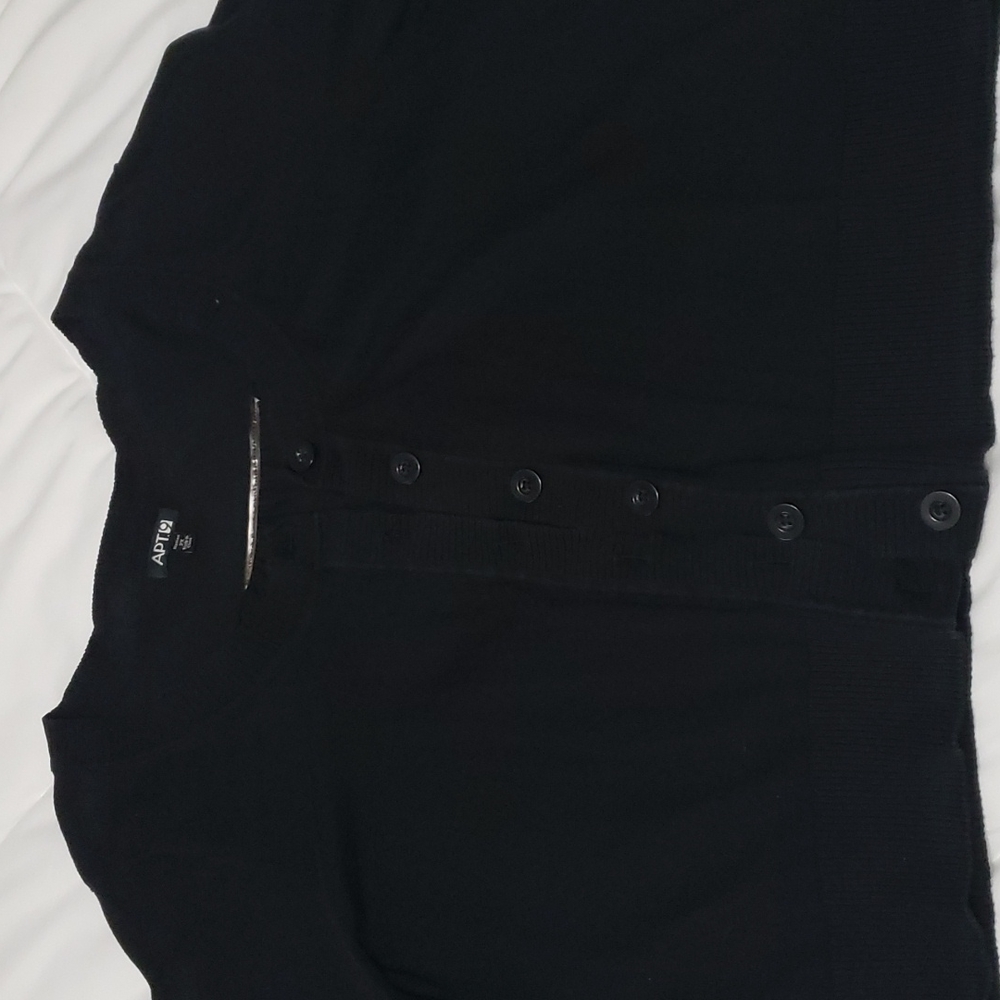 Black cardigan with buttons.